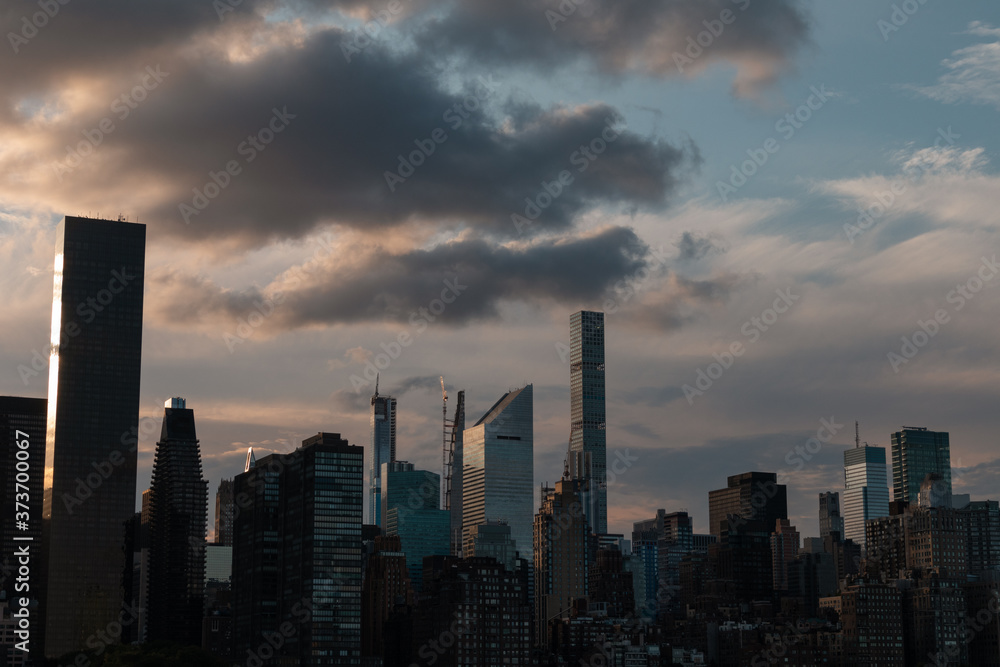 Beautiful Silhouettes of Skyscrapers in the Midtown Manhattan Skyline during a Sunset in New York City