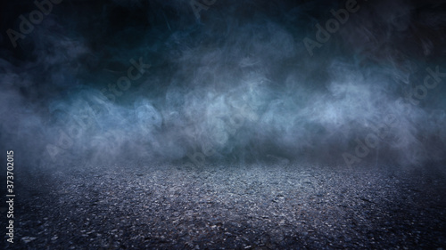 Texture dark asphalt floor with smoke.
