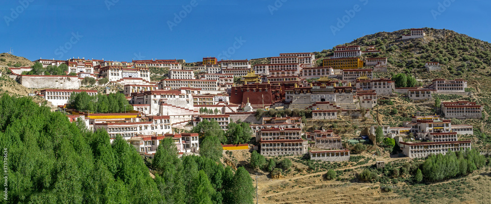 Lhasa former Tibet now China, Ganden Monastery mountain panorama mountain panorama with winding road that climbs