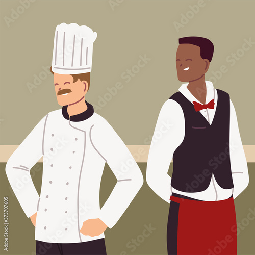 portrait of chef and waiter in working uniform