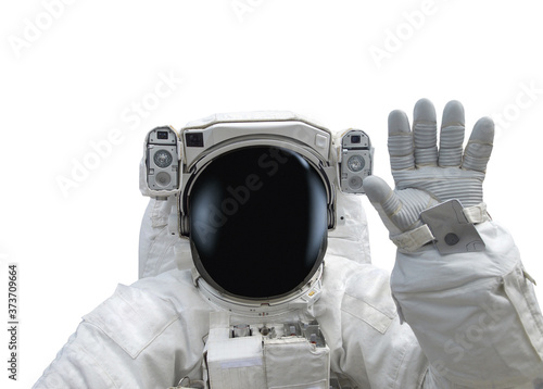 Astronaut in spacesuit raise hand as greeting