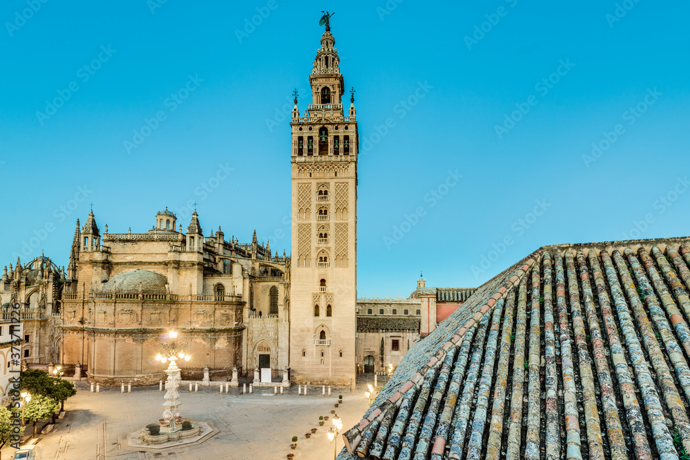 Naklejka premium Giralda in the city of Seville in Andalusia, Spain.
