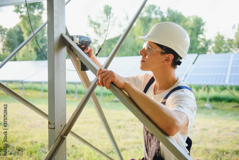 Renewable energy and solar power concept, worker or Electrical engineers are checking and training installing photovoltaic plant in solar power station alternative energy from nature Renewable energy and solar power concept, worker or Electrical engineers are checking and training installing photovoltaic plant in solar power station alternative energy from nature
