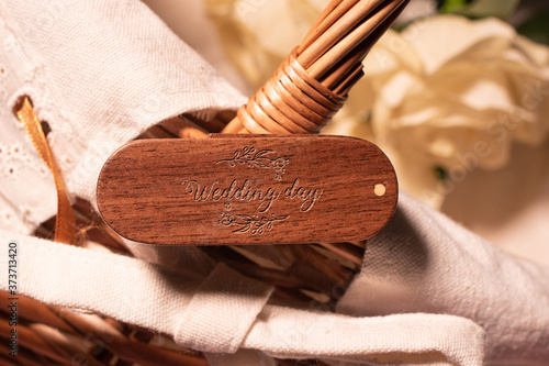 Fényképezés Beautiful wedding flash drive with the inscription Wedding Day from a tree engraved