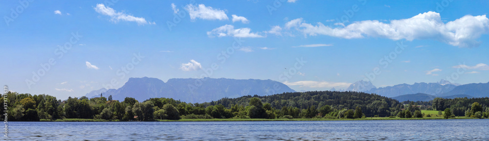 Panorama within the warmest swimming lake of Bavaria, Abtsdorf, with the view to the Hohenstaufen and the Vorderstaufen mountain range