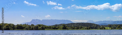 Panorama within the warmest swimming lake of Bavaria, Abtsdorf, with the view to the Hohenstaufen and the Vorderstaufen mountain range © designnatures