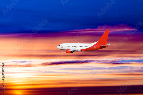 airplane on sunset background. Passenger airliner. Commercial aircraft. Private jet