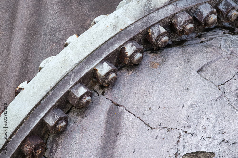 Closeup of Nuts and Bolts on Large Intake/Outtake Pipe at Flood Control Pump Station Closeup of Nuts and Bolts on Large Intake/Outtake Pipe at Flood Control Pump Station