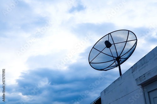 satellite dish against blue sky