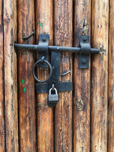 old lock on a wooden door