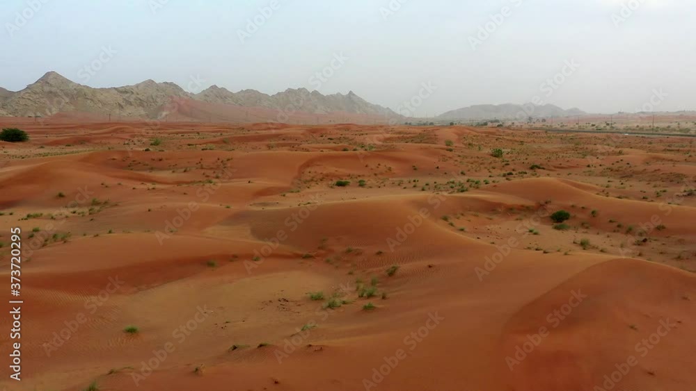 Drone view of Dry Desert in Dubai with Sand Ripples, Geological Landscape of High Dune Desert in United Arab Emirates
Drone view of Dry Desert in Dubai with Sand Ripples, Geological Landscape of High Dune Desert in United Arab Emirates