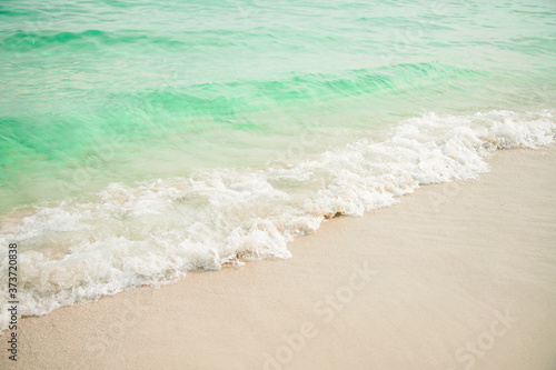 Wallpaper Mural  Blue sea ocean, water sun reflection, and sand background. Torontodigital.ca