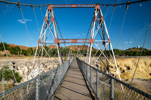 Swinging pedestrian bridge in Hot Springs State Park in Thermopolis, Wyoming