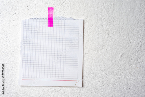 A sheet of paper is glued t...