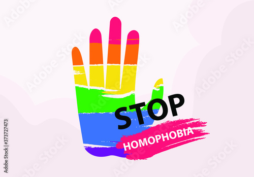 Stop Homophobia vector concept: rainbow pride colored palm hand with Stop Homophobia words