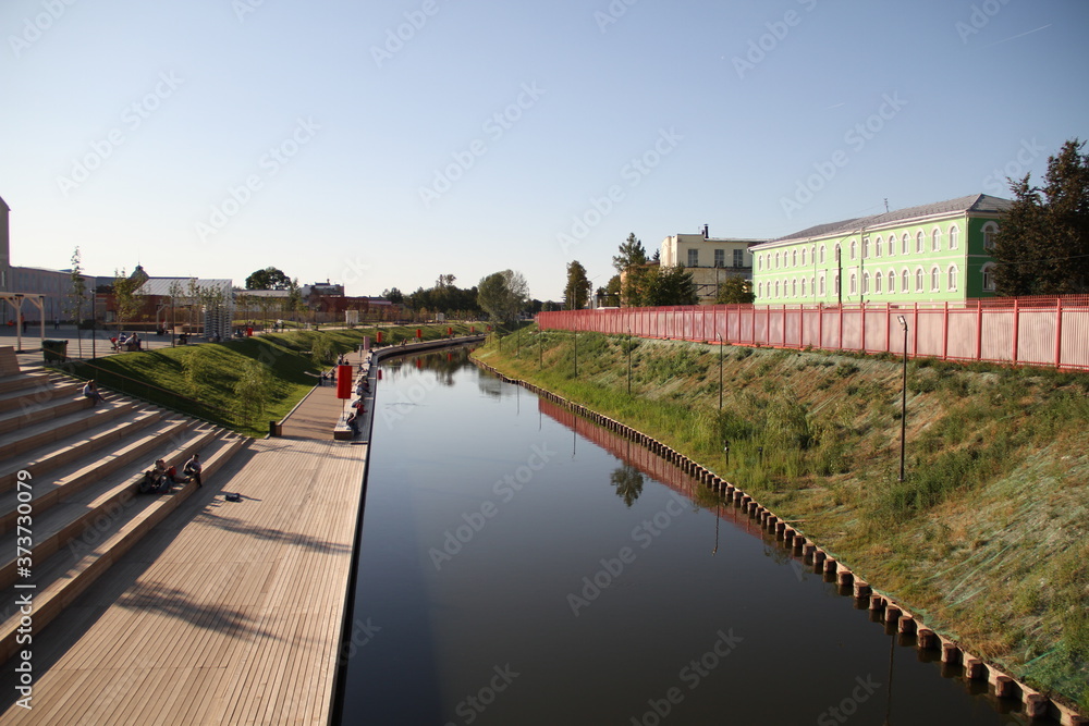 Embankment in Tula, Russia. People walk along the embankment after a long period of self-isolation and quarantine. City architecture