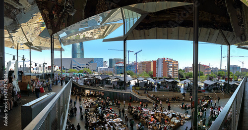 Mercat dels Encants Vells flea market with a mirrored canopy, in Barcelona, Spain photo