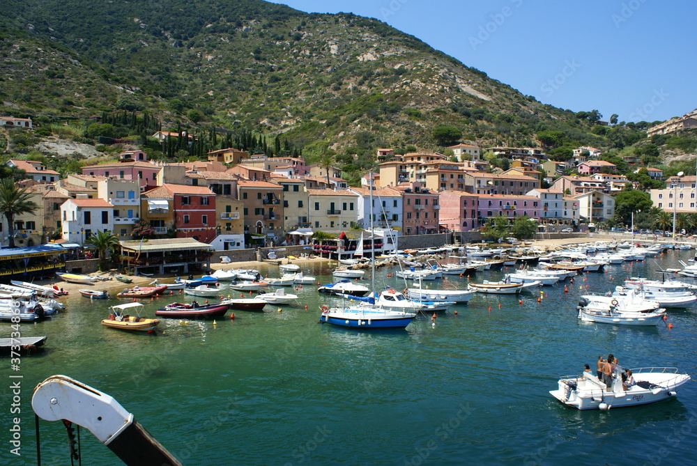Giglio Island, Tuscany (Italy): a view of Giglio Porto seafront on a Summer day