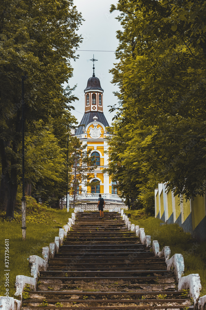 Traveller climbs the stairs to the castle of Manuc Bei (bey) in Moldova Traveller climbs the stairs to the castle of Manuc Bei (bey) in Moldova