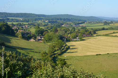 Oborne with the ruins of Sherborne Old Castle, and New Sherborne Castle in the background, early morning view from Donkey Lane trail, Sherborne, Dorset, England photo