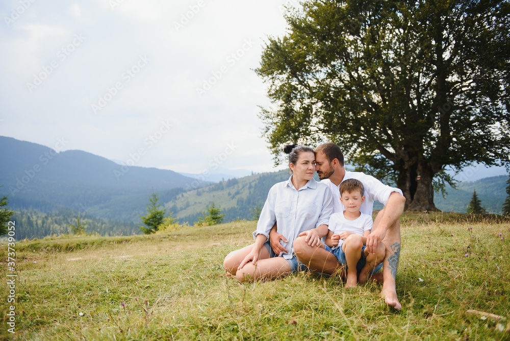 young family resting in the mountains. National Park. young family resting in the mountains. National Park.
