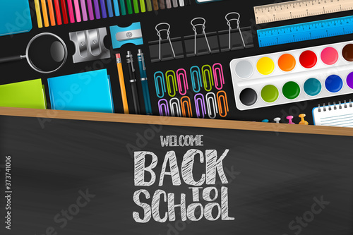 Welcome back to school sign on blackboard with wooden frame. Colorful stationery on dark background. Vector illustration.