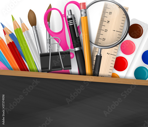 School design with realistic supplies on blackboard background, and free space for text. Vector illustration.