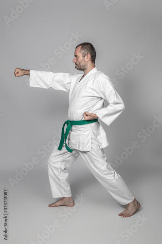 martial arts practitioner performing a kata.