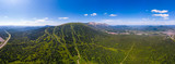 Summer Sheregesh Kemerovo region, Russia, panorama of Mount Zelenaya and Mustag. Aerial top view