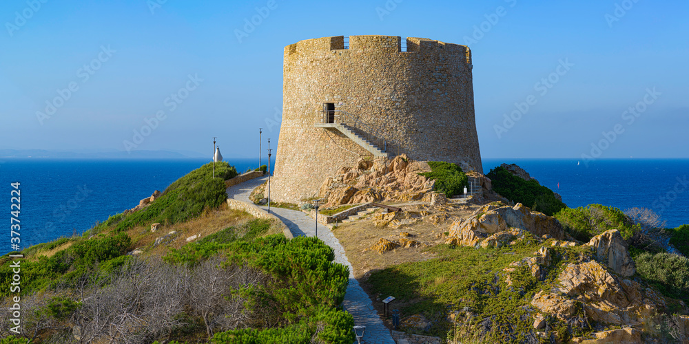 Italy, Sardinia, Northern Sardinia, Santa Teresa di Gallura, Torre di Longonsardo tower. In the background you can see the coasts of Corsica, France