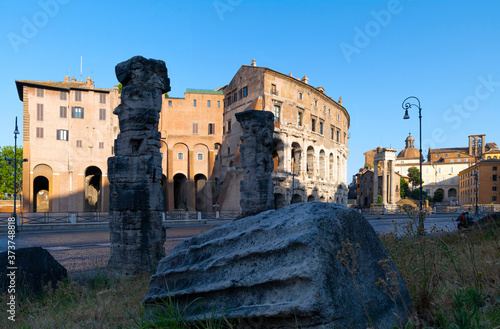 View of colossal Roman ruins with the theater of Marcello, ruins of the temple of Apollo in the Campo Marzio area known as Circo Flaminio between the Tiber river and the Capitoline Hill. Rome Italy. photo