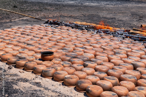 Casserole clay pot production using traditional methods. clay pot in a raw