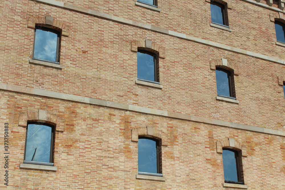 Windows, old building, bricks, Barcelona, Spain. Windows, old building, bricks, Barcelona, Spain.