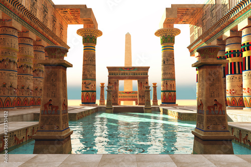 Fotografiet Egyptian Pool with Obelisk - Ornate Egyptian architecture with hieroglyphs surround a pool in historical Egypt with an obelisk standing guard
