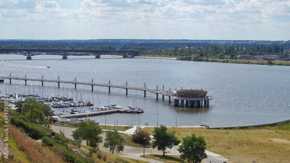 View of the Vistula river, bridge, pier and marina in Płock, Poland
