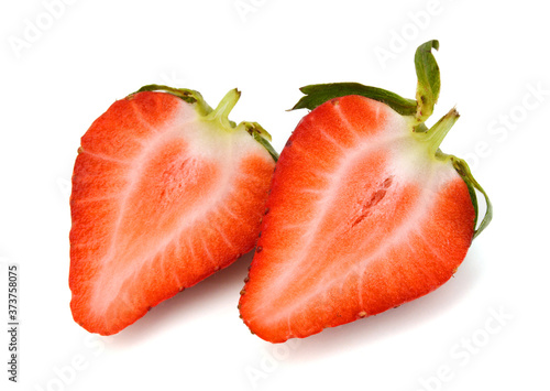 Two sliced strawberries isolated on white