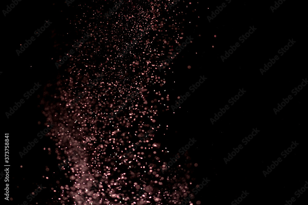White dust on a black background, selective focus. White dust on a black background, selective focus.