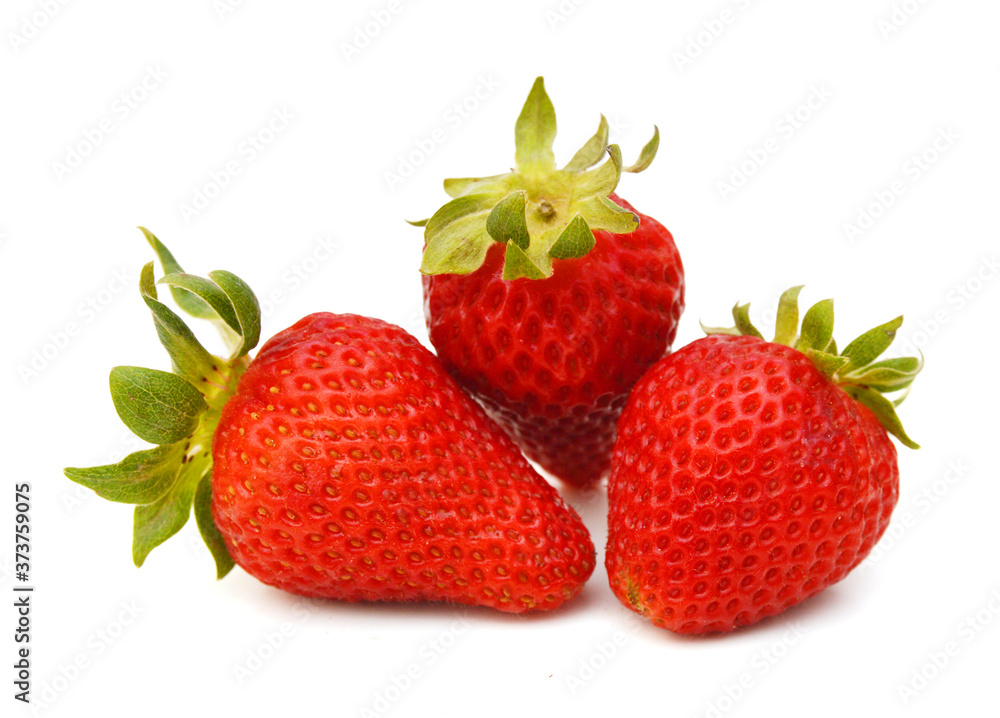 Three strawberry isolated on a white background, macro image Three strawberry isolated on a white background, macro image