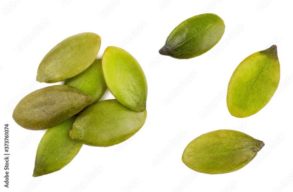 Pumpkin seeds isolated on white, top view. Pumpkin seeds isolated on white, top view.
