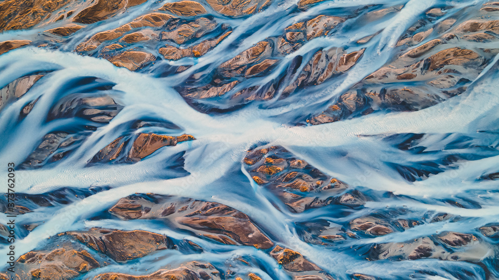 A glacial rivers from above. Aerial photograph of the river streams from Icelandic  glaciers. Beautiful art of the Mother nature created in Iceland. Wallpaper  background high quality photo Photos | Adobe Stock