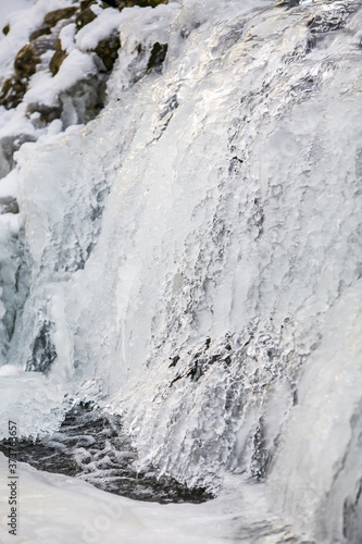 Winter Landscape With Frozen Waterfall. High quality photo © Bjorn B