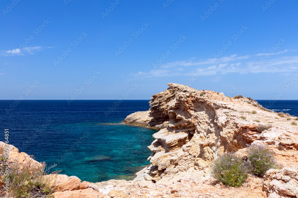 Frozen wave in stone at the cape of Punta Galera. Ibiza, Balearic Islands, Spain