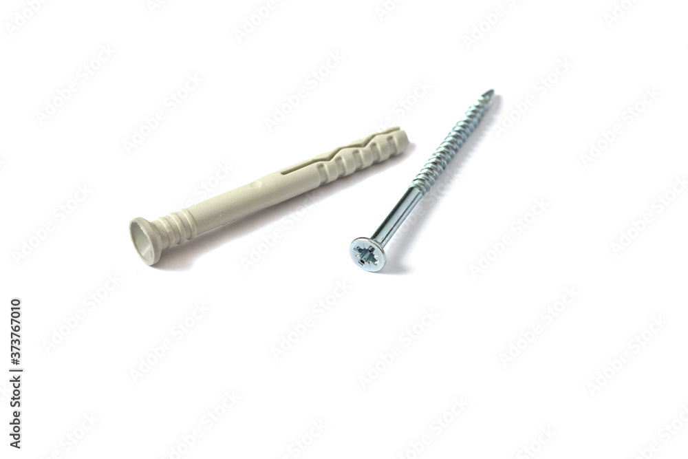 Dowel nail for attaching to dense materials as bricks, stone, concrete. Type of fixture in construction. Isolated on white background. Dowel nail for attaching to dense materials as bricks, stone, concrete. Type of fixture in construction. Isolated on white background.
