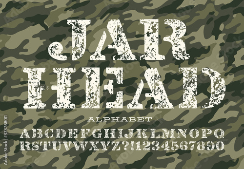 Jarhead is a grunge stencil alphabet in military style lettering on a green camouflage background.