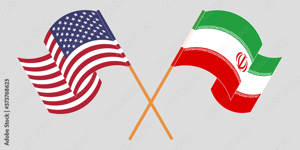 Crossed and waving flags of Iran and the USA