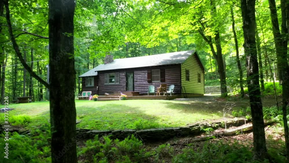 Scenic Pull Back View of a Cabin Set Deep in the Woods Scenic Pull Back View of a Cabin Set Deep in the Woods