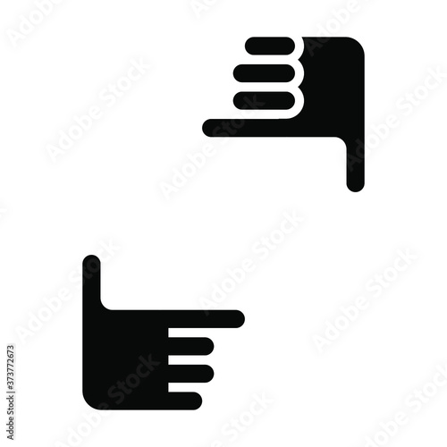 Two hands form a picture frame icon. Photo sign made by human fingers, Black symbol on white background.