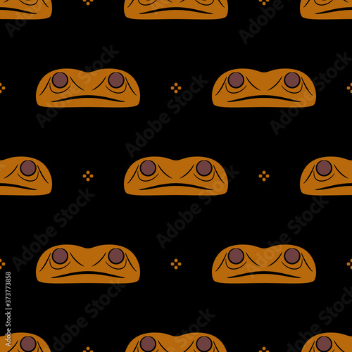 Seamless ethnic pattern with Native American motifs of Haida Indians. Stylized face of frog totem.