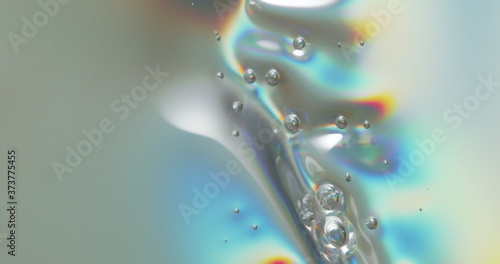 Bubbles On Melting Plastic. Bubbles forming across a melting plastic surface.