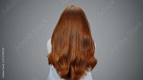 Gorgeous falling red hair in slow motion.